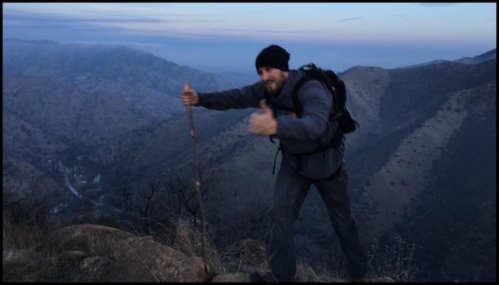 Man on a Mountain With a Walking Stick | AdventureHacks