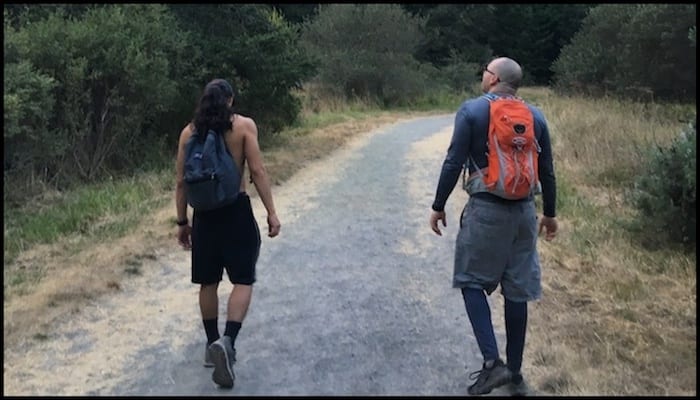 Hikers walking on a trail with Different Hiking Packs | AdventureHacks