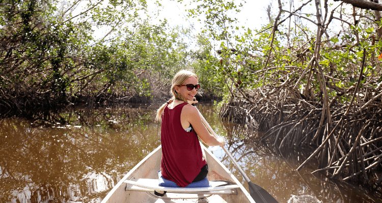 Adventure Hacks explorer paddling through the Florida Everglades with her husband. 