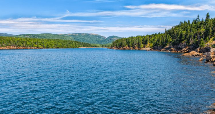 AdventureHacks team take a breather during their hike in Acadia National Park. Picture is of one of the many gorgeous lakes in the area. 