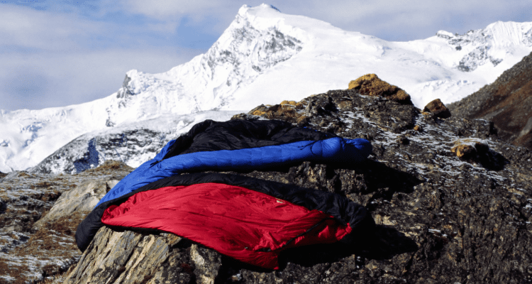Airing out sleeping bags after use during a camping trip