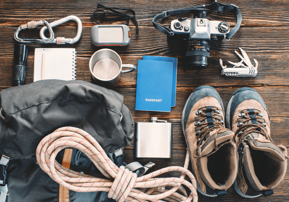 Essential Hiking gear laid out on a table prior to a hike